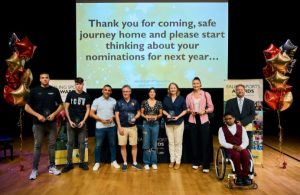 Selection of winners in the Ealing Sports Awards on stage at ceremony