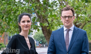 Woman and man smartly dressed looking towards the camera. They are local councillors Blerina Hashini and Peter Mason