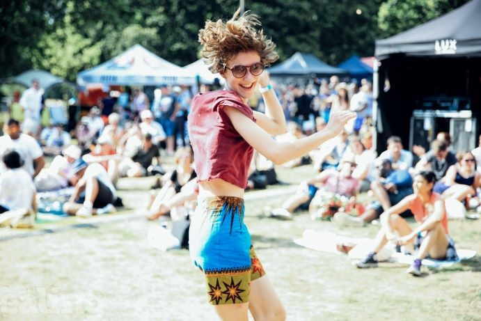 woman dancing in Walpole Park at Ealing Summer Festivals