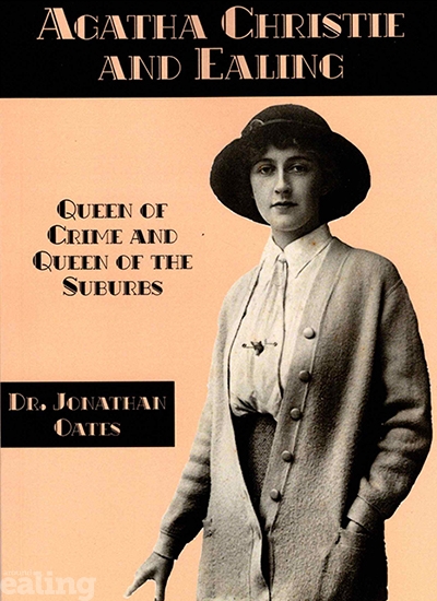 The front cover of a book, displaying an old photo of a woman wearing a suit and hat