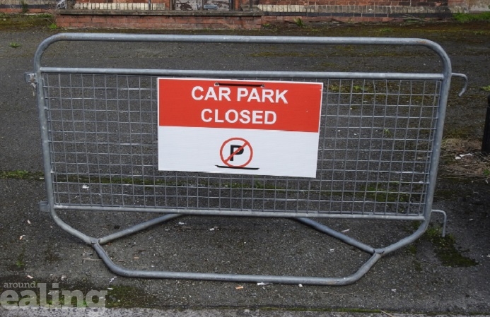 Metal barrier with the sign CAR PARK CLOSED