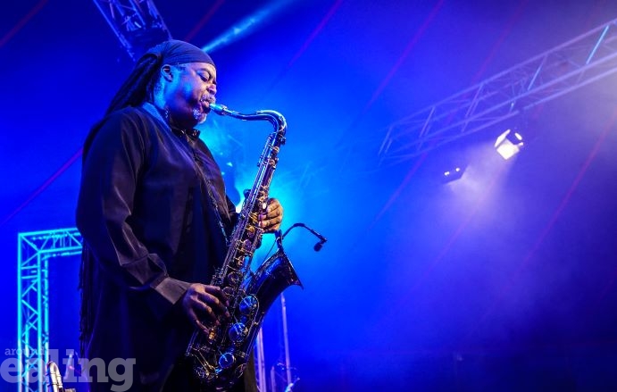 Jazz artist playing the sax on stage