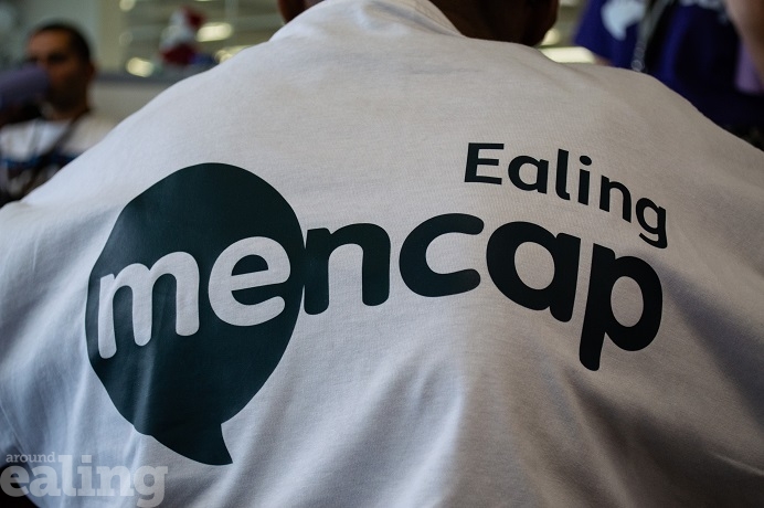 White t-shirt with Ealing Mencap written on it in black