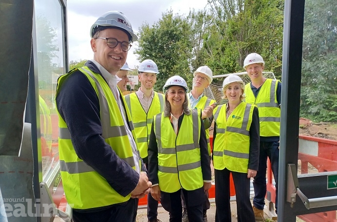 Cllrs Mason, Blacker, Anand, architect Emma and GV contractor-Daniel in hard hats and hi-vis.