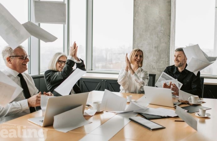 Group of seniors working in business at desk