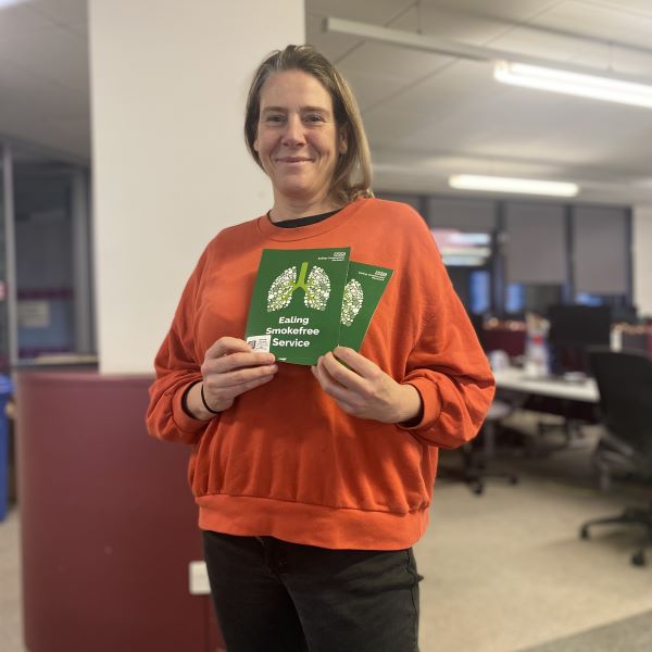 Councillor Polly Knewstub holding Ealing smokefree service leaflets