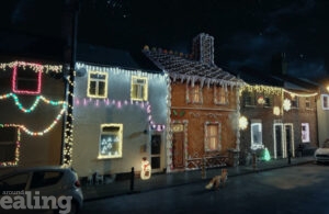 Row of houses decorated to look like they are made of gingerbread and icing