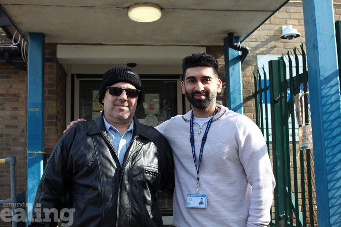 Costel and Hani posing for a picture in front of Featherstone Clinic in Southall