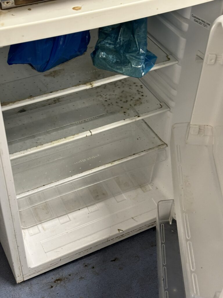 Dirty fridge at Bread Spread factory